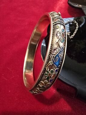 Chinese vermeil bracelet is a vintage piece made of cloisonne silver with gold